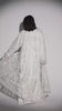 Video of a model cat walking with a luxury bridal abaya